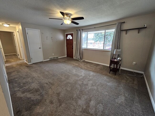 Building Photo - Welcome home to this maintained 4-bedroom, 2-bath Home in 80909!