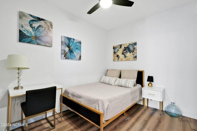 Building Photo - Welcome to your dream condo in the heart o...