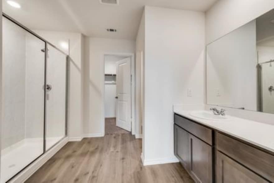 Master bathroom with large walk-in closet & walk-in shower - 1131 Elijah Way