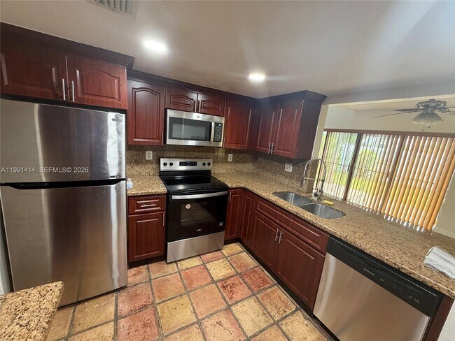 Building Photo - 1221 SW 124th Ct