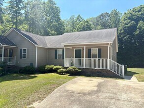 Building Photo - 105 Lonesome Wind Way