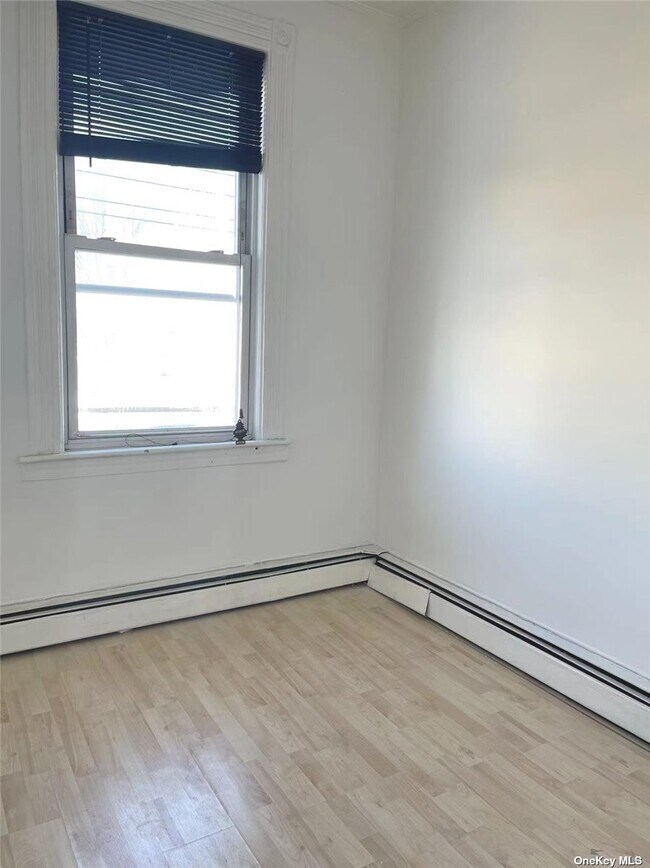 Building Photo - 60-12 56th Dr