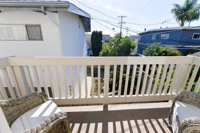 Building Photo - Sunny 2BR/2BA Coastal Retreat — Steps from the Sand with Ocean Breezes
