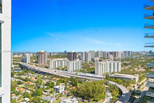 Building Photo - 18911 Collins Ave