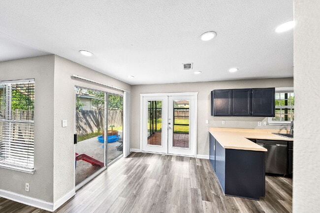 Building Photo - A Waterfall Shower, a Sunroom, and a Story Worth Coming Home To