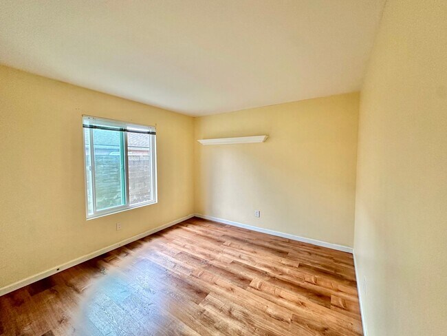 Building Photo - Remodeled 4 bedroom with central A/C and 2 car garage!