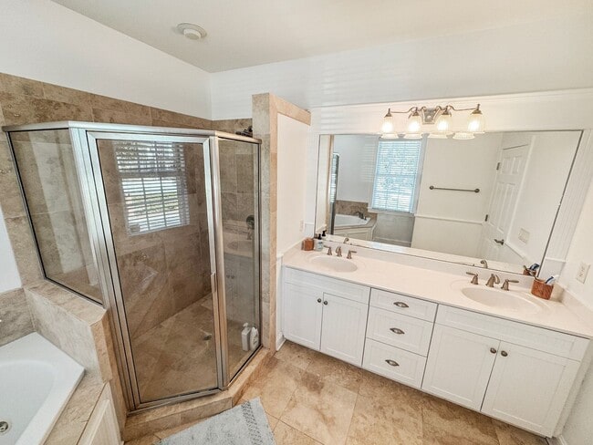 Building Photo - Fully Furnished Waterfront Elegance on Mai...
