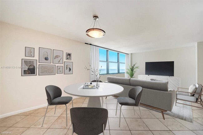 Building Photo - 1 br, 1.5 bath Condo - 5055 Collins Ave Ap...