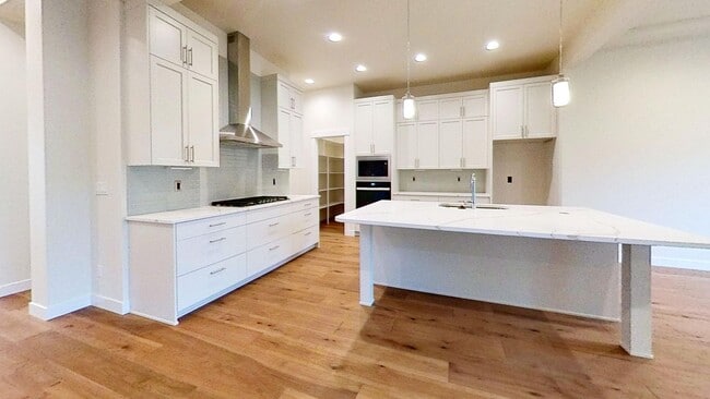 Building Photo - Contemporary 4 Bedroom Oasis on Quiet Dead...