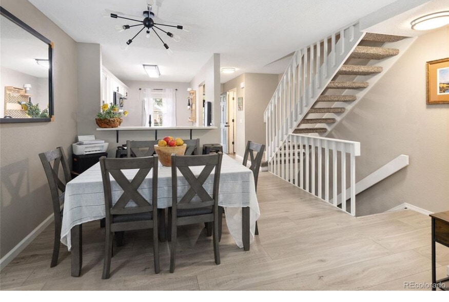 Dinning into kitchen - 10587 W Maplewood Dr