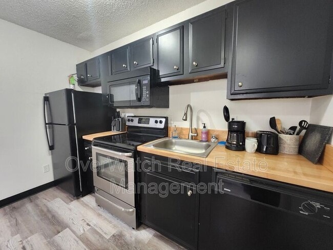 Building Photo - 3007 W 33rd Ave
