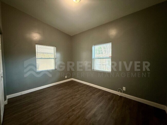 Building Photo - Fully Renovated 2BR Brick Home with Vaulted Ceilings & Backyard Retreat!