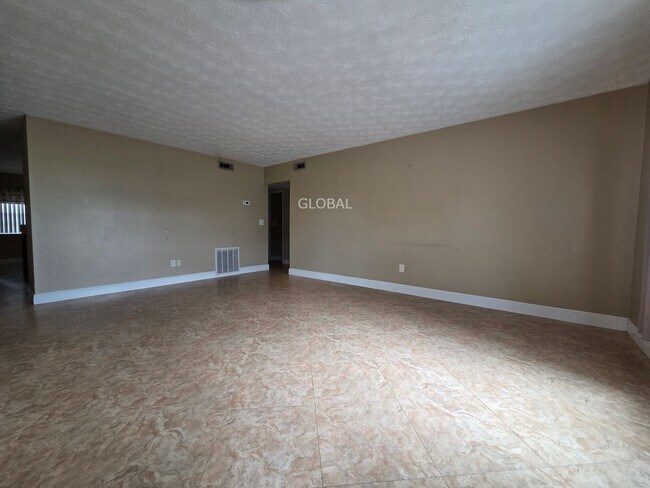 Building Photo - Lakefront First-Floor Condo in Camelot by ...