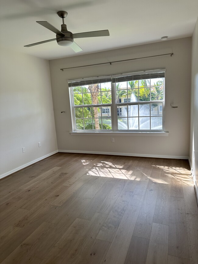 Primary bedroom, wooden floors in all 3 bedrooms - 127 Explorer Dr