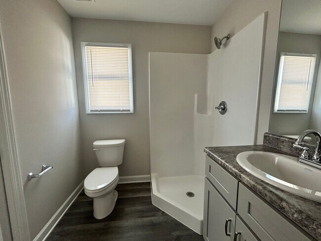 Building Photo - Three bedroom three bath available now!