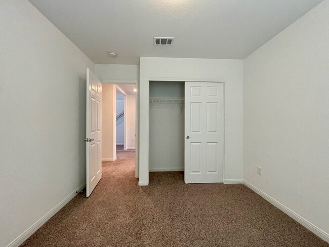 Building Photo - BEAUTIFUL 5 BED 3.5 BATH 3 FLOORS 2 CAR GARAGE SINGLE FAMILY HOME W/ LARGE LOFT & BACKYARD FOR RENT!
