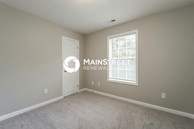 Building Photo - 4 Bedroom Pet-Friendly Home in Rex, GA with Main Street Renewal