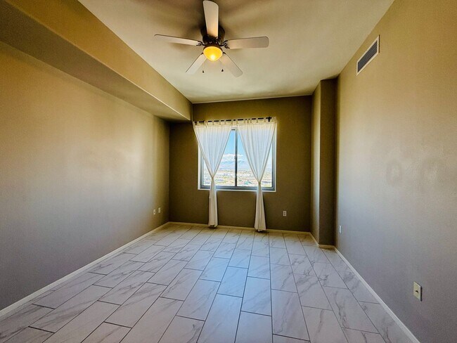Building Photo - Modern High-Rise Condo with Stunning City and Mountain Views-Near LV Strip, Allegiant Stadium, To...