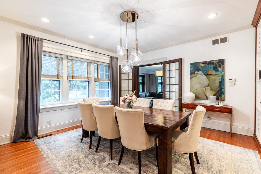 Dining room view to den with French doors. - 4061 Beechwood Ave