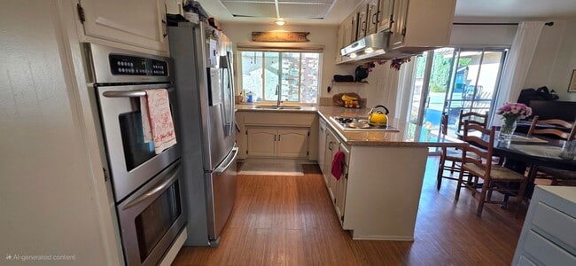 Building Photo - Spacious 4-Bedroom 2 Bath Home with a Large, Serene Backyard and Courtyard.