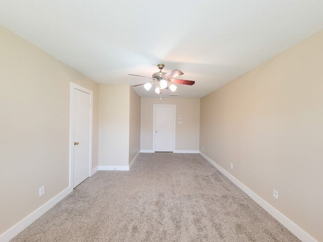 Building Photo - 3 bedroom one story home on large corner lot. Home has hard flooring throughout living areas and ...