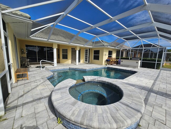 Building Photo - Waterfront Pool Home AVAILABLE NOW!