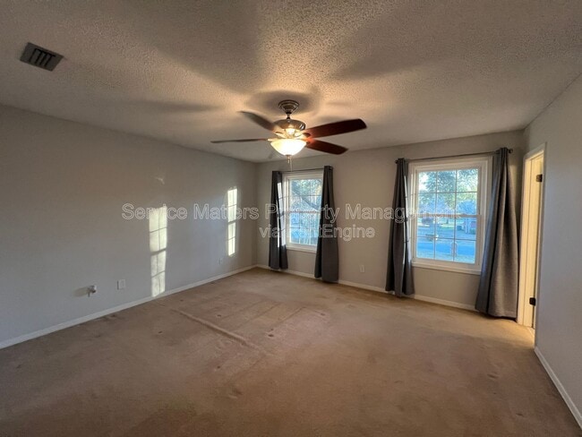 Building Photo - 6004 Players Pl