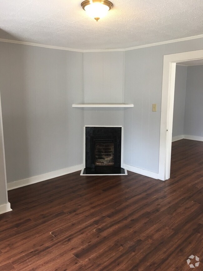 Building Photo - Your Own Home and Yard Centrally Located 3...