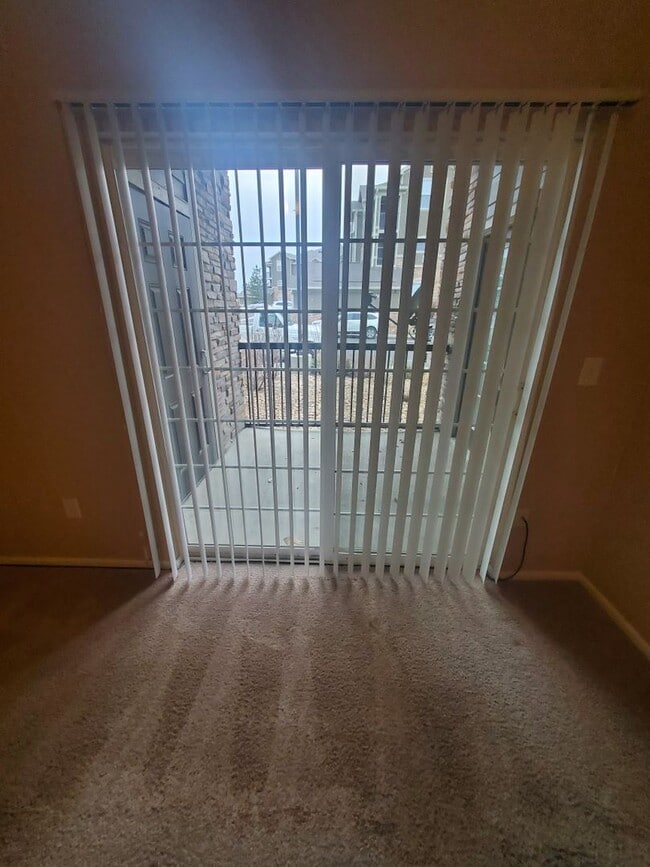 Building Photo - Spacious 2B/2B Main Level Condo With Garage NOW AVAILABLE