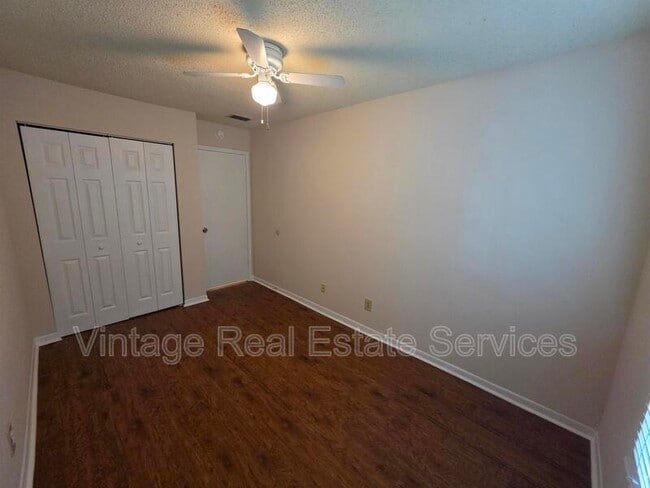 Building Photo - 5202 Sunridge Palms Dr