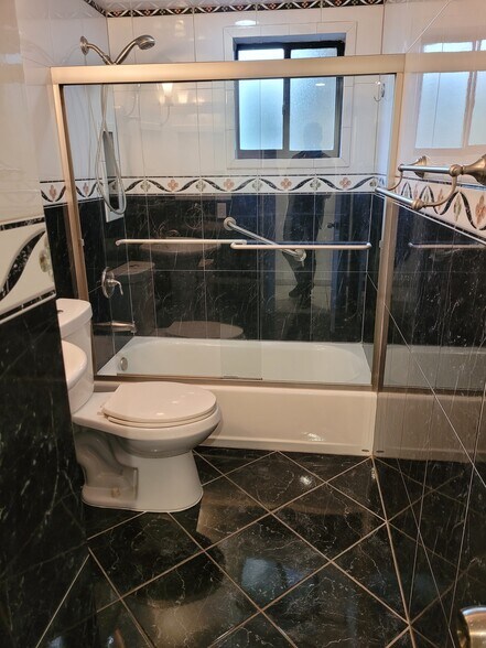 Guess Bathroom - 8615 NW 8th St