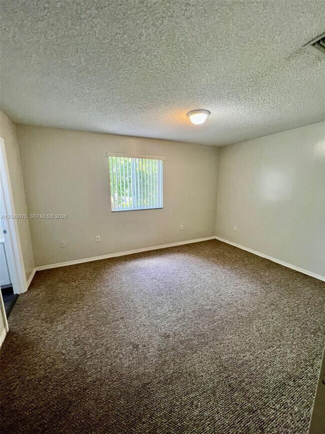Building Photo - 6975 NW 173rd Dr