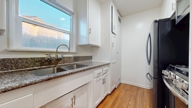 Building Photo - 9026 Reading Ave