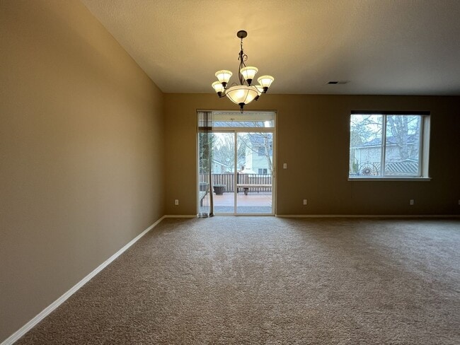 Building Photo - Inviting Two-Story 3BR Home Featuring Gas Range, Walk-In Closet, and Built-In Deck Seating