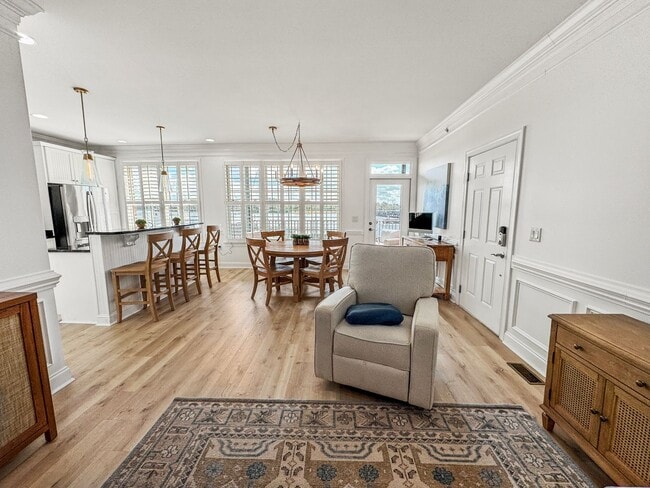 Building Photo - Fully Furnished Waterfront Elegance on Mai...