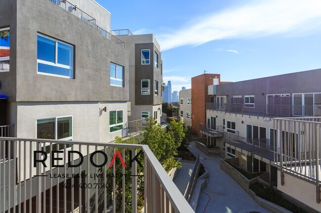 Building Photo - 1011-1013 Everett St-A-202