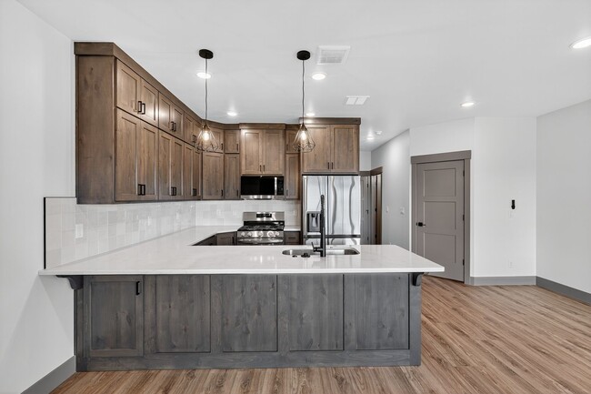 Building Photo - BRAND NEW3 BED 2.5 BATH TOWNHOME WITH 2 STALL GARAGE