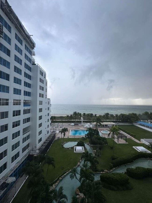 Building Photo - 5005 Collins Ave