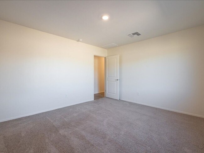 Building Photo - Spacious 4-Bedroom Home with Open Layout & Turf Backyard