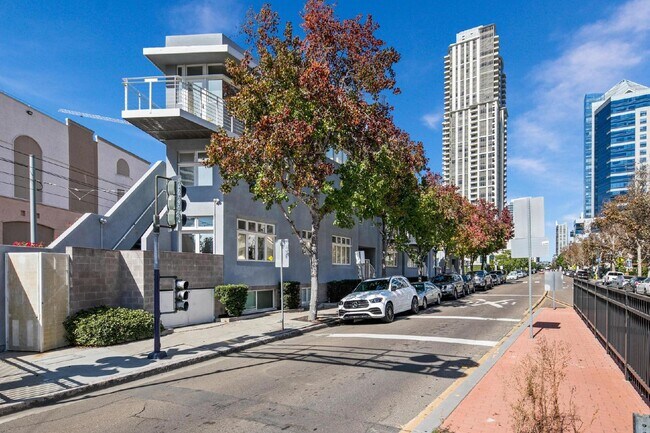 Building Photo - Live in one of San Diego’s most desirable locations in This award-winning architectural gem, "7 o...