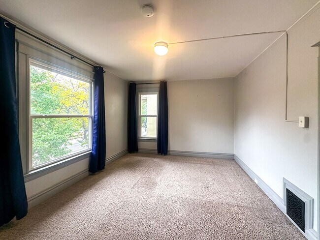 Building Photo - A home where old-world charm meets modern sophistication!