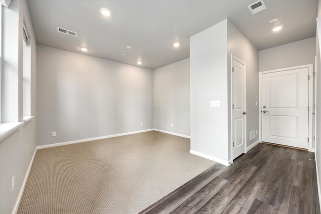 Building Photo - Gorgeous NEW Three Story Townhome with two car attached garage!