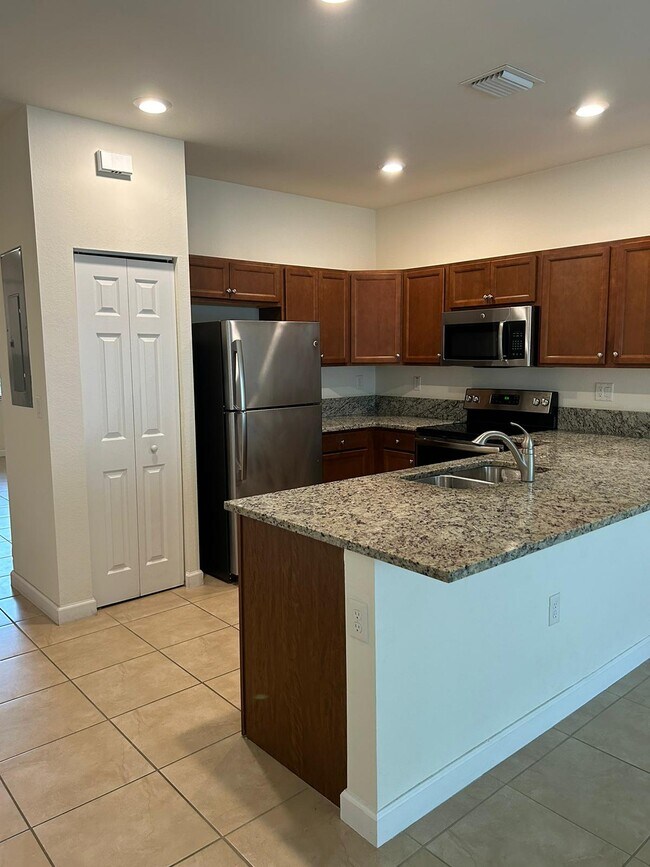 Building Photo - 9332 W 33rd Ln