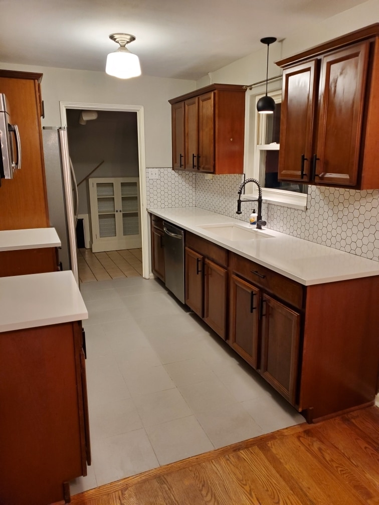 Kitchen has had a cosmetic overhault and now looks like this! - 5701 E 28th Ave