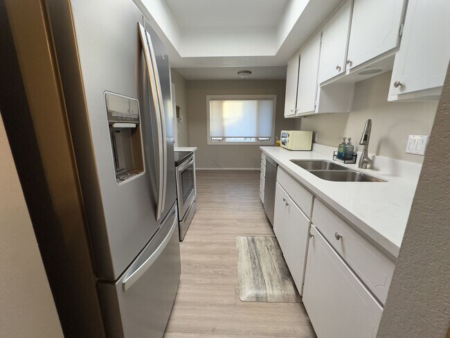 Building Photo - For Lease -Partially Furnished $2,599 or Unfurnished $2,300 2 Beds-2 Bath Painted Mountain Golf C...
