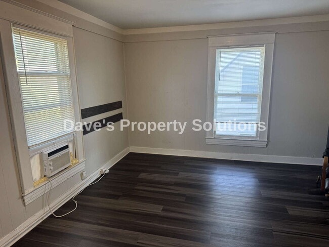 Building Photo - Move-In Ready Upstairs Unit | New Flooring, Eat-In Kitchen & Tons of Closets