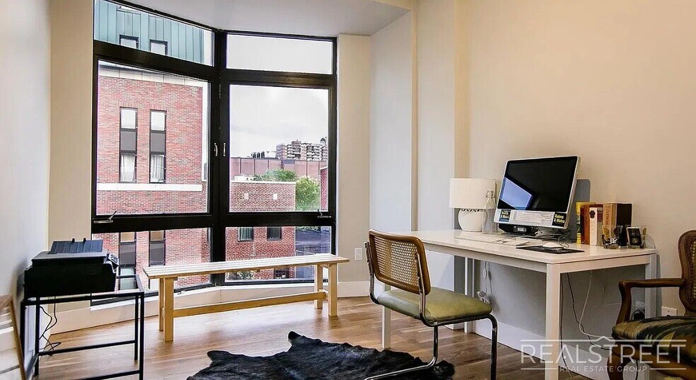 Building Photo - Bright 2 Bed / 1 Bath Loft-Style Residence with Multiple Balconies & Premium Amenities