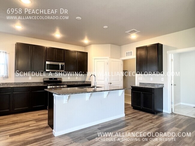 Building Photo - 6958 Peachleaf Dr