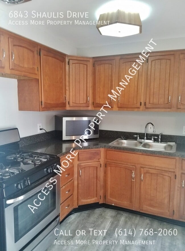 Building Photo - 6843 Shaulis Dr