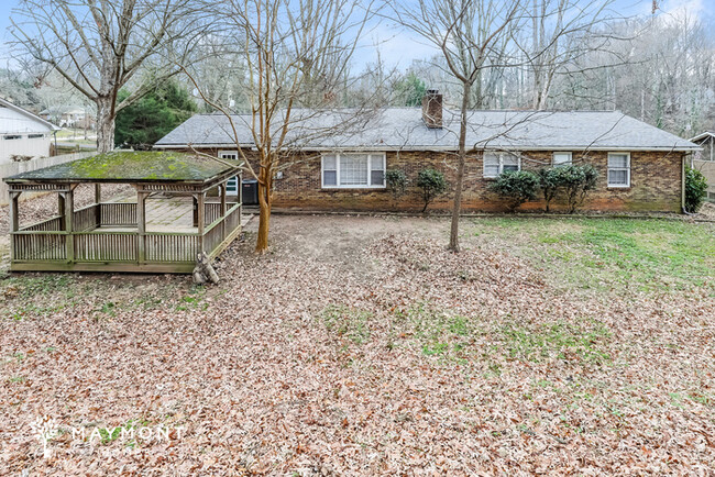 Building Photo - Inviting 4 Bedroom Home